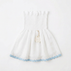 Blusa blanca con ondulina azul claro