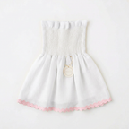 Blusa blanca con ondulina rosa pastel