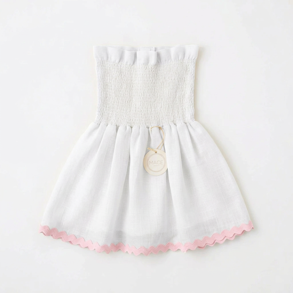 Blusa blanca con ondulina rosa pastel