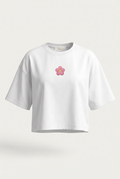 T-shirt women blanca con parche pequeño de flor rosa
