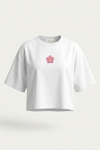 T-shirt women blanca con parche pequeño de flor rosa