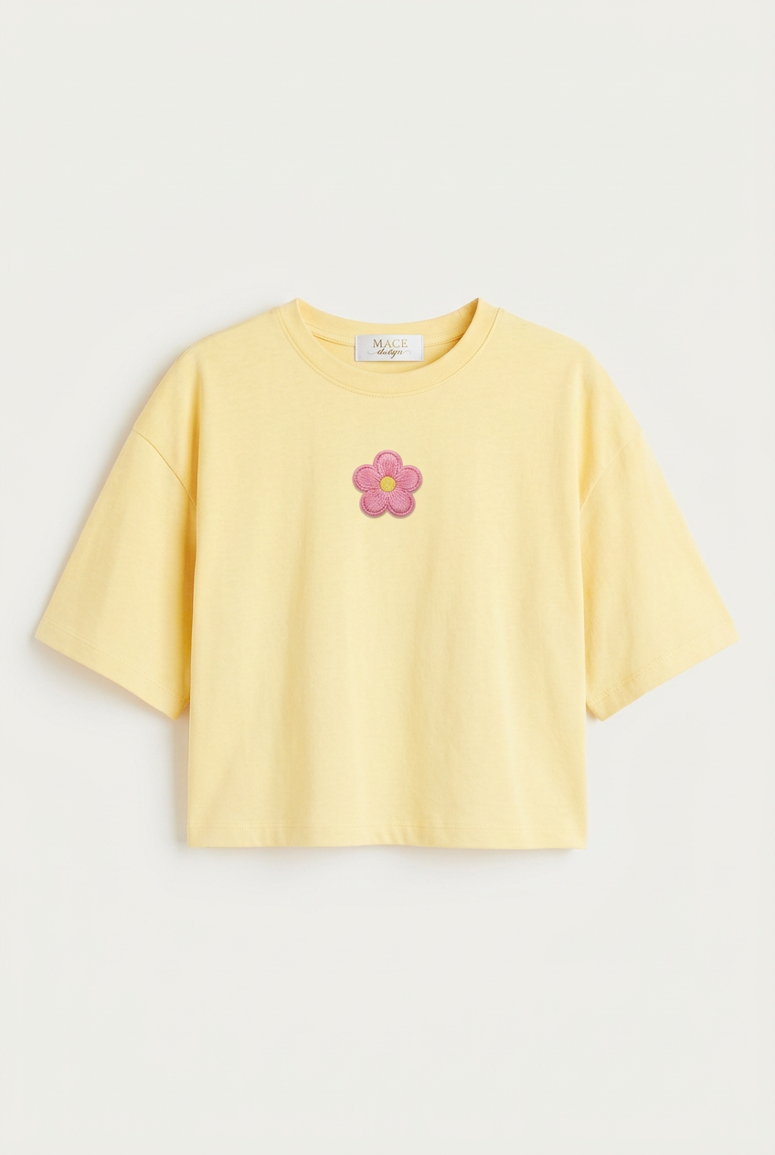T-shirt women amarillo pastel con parche pequeño de flor rosa