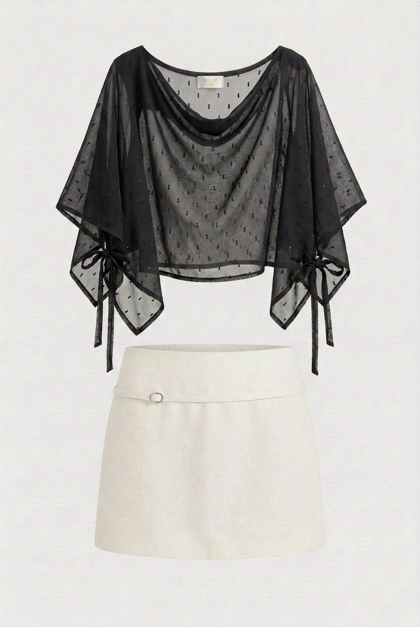 Set negro transparente con falda cruda